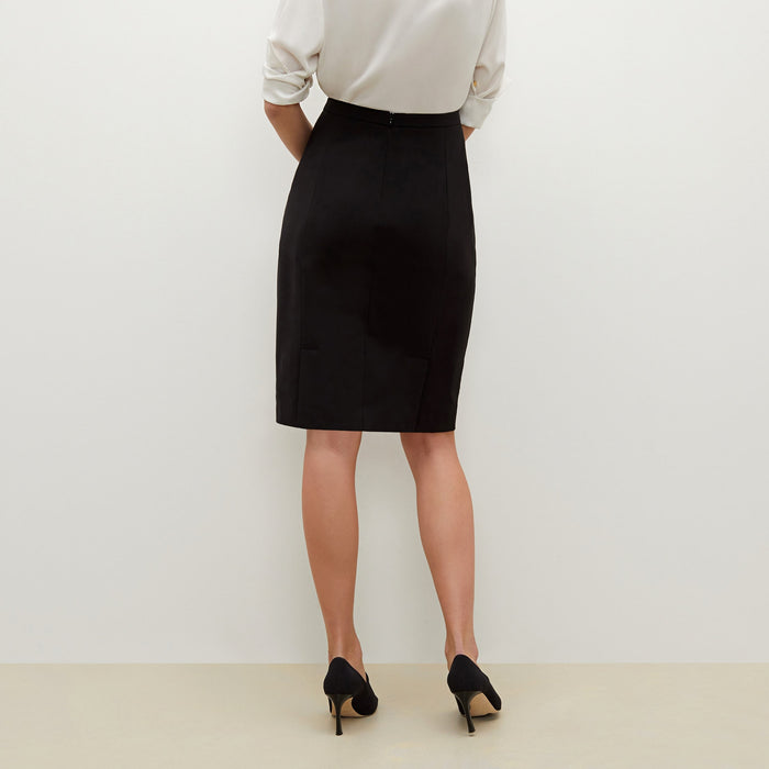Back image of a woman standing wearing the cobble hill packable suiting in black | Exclude