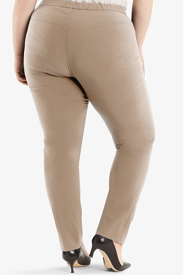 Back image of a woman standing wearing the Foster Pant in Russet | Plus Hover | Exclude