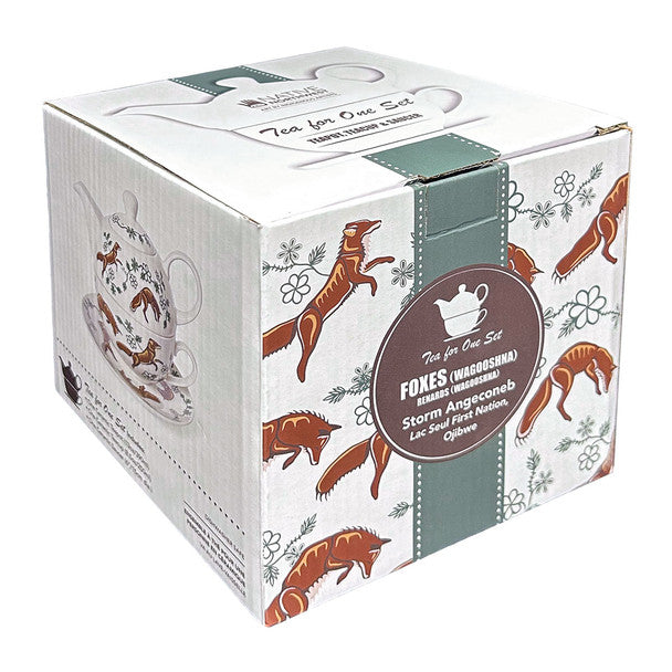 A square white cardboard tea gift box with illustrated foxes, floral motifs, and a dark green band. A large oval label on the front reads 'Tea for One Set'.