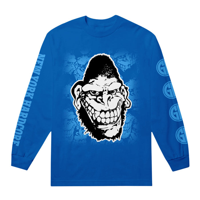 A blue long-sleeve Gorilla Biscuits shirt with a large black and white cartoon gorilla face on the front, NEW YORK HARDCORE text on the right sleeve, and circular logos on the left sleeve.