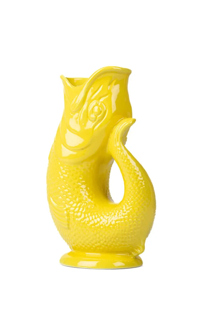 Yellow fish-shaped vase on a white background