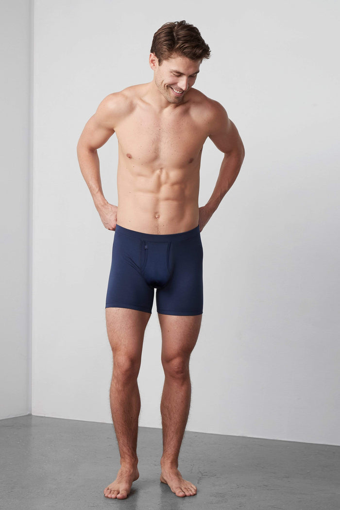 Full body front view of a man wearing Silver HD Boxer Brief in True Navy