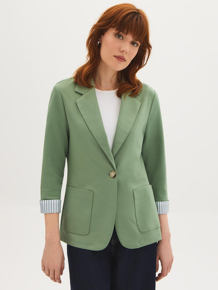 Lilac knit blazer with 3/4 sleeves and striped cuff lining, featuring patch pockets by Le Chateau.