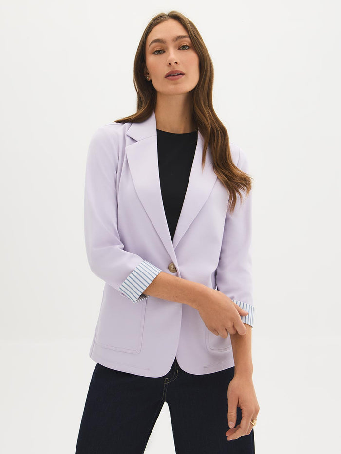 Lilac knit blazer with 3/4 sleeves and striped cuff lining, featuring patch pockets by Le Chateau.