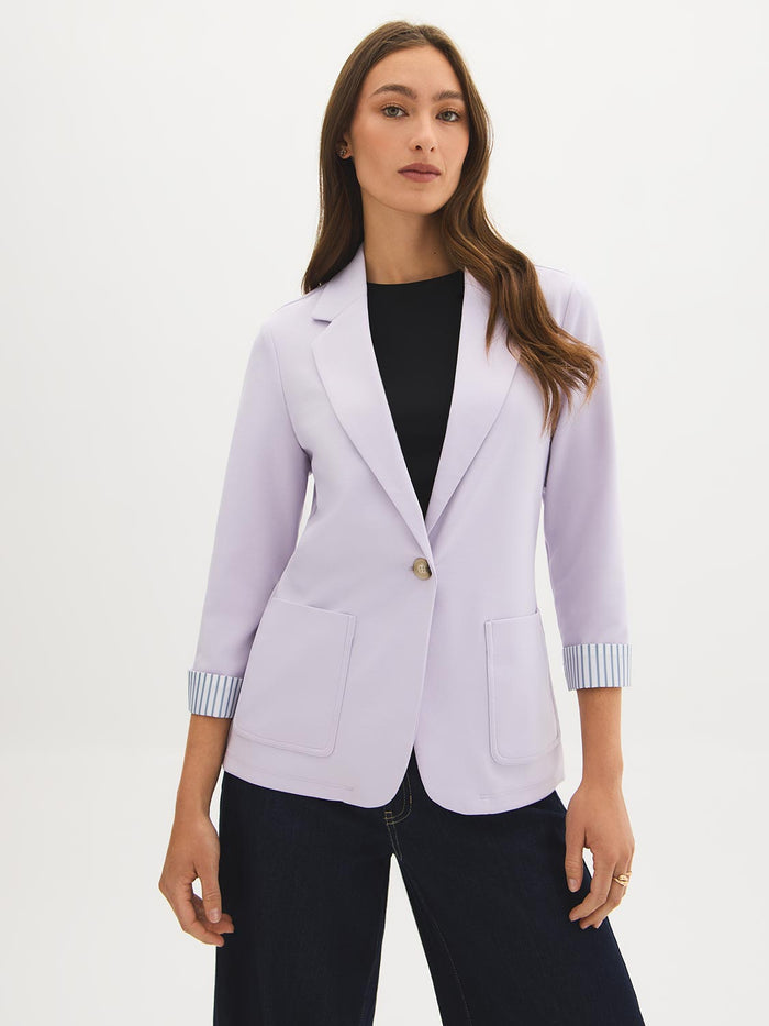 Lilac knit blazer with 3/4 sleeves and striped cuff lining, featuring patch pockets by Le Chateau.