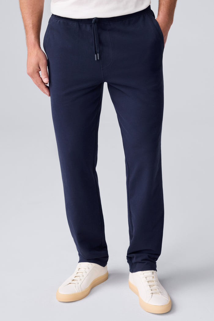 Front view of a man wearing ACE Straight Leg Pant in Total Eclipse Blue