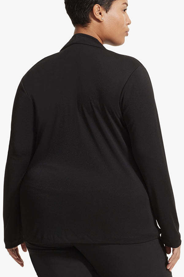 Back image of a woman standing wearing the Alma top in Black | Grid Hover | Exclude