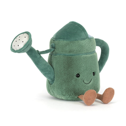 Plush toy watering can with a smiling face and small legs on a white background.