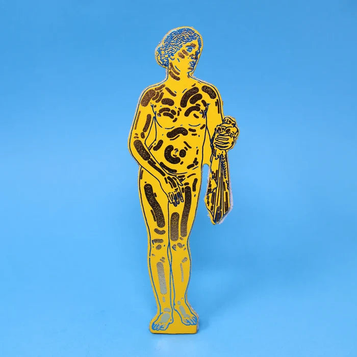 A leather bookmark shaped as the classical Aphrodite statue, rendered in bright yellow with shiny gold metallic block shading and details.