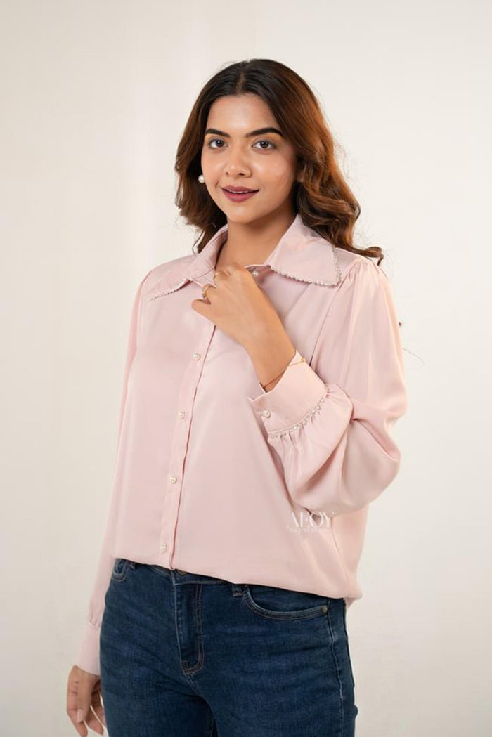 Pink shirt with pearl embellishment