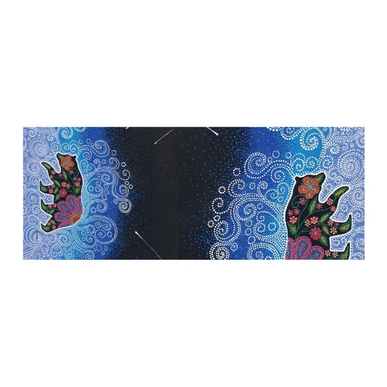 Decorative mat with floral cat design on a blue and black background