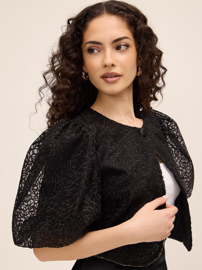 Embroidered Floral Bolero by Le Chateau.