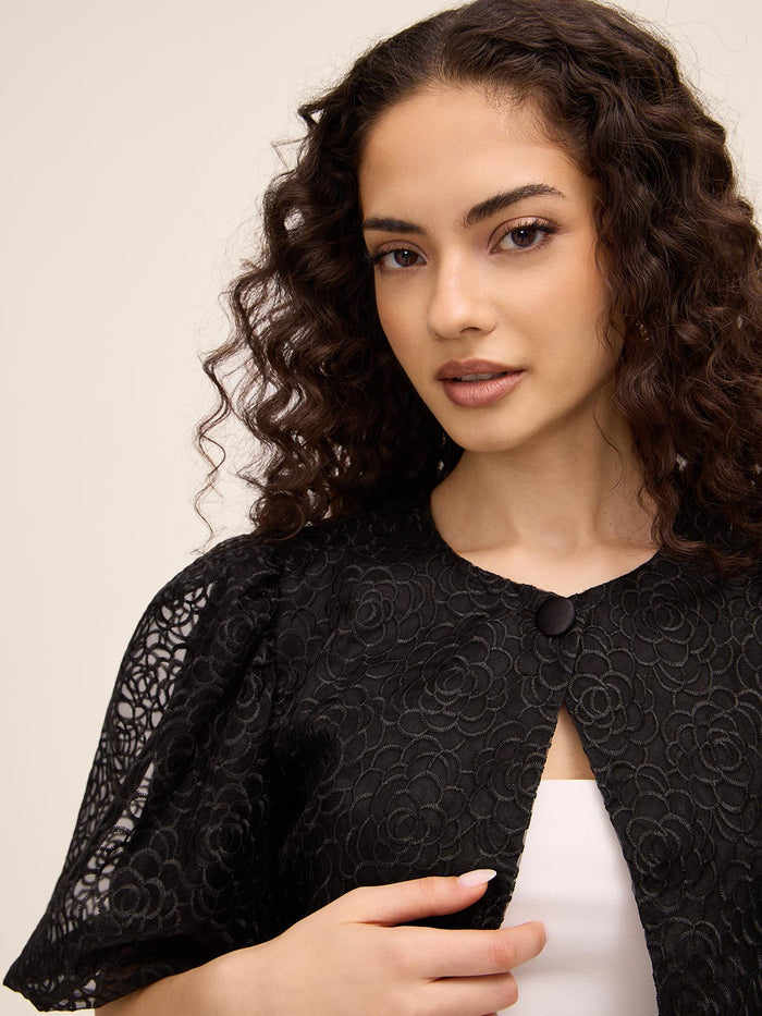 Embroidered Floral Bolero by Le Chateau.