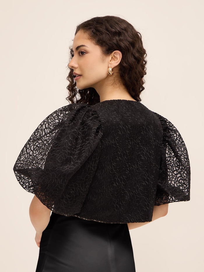 Embroidered Floral Bolero by Le Chateau.