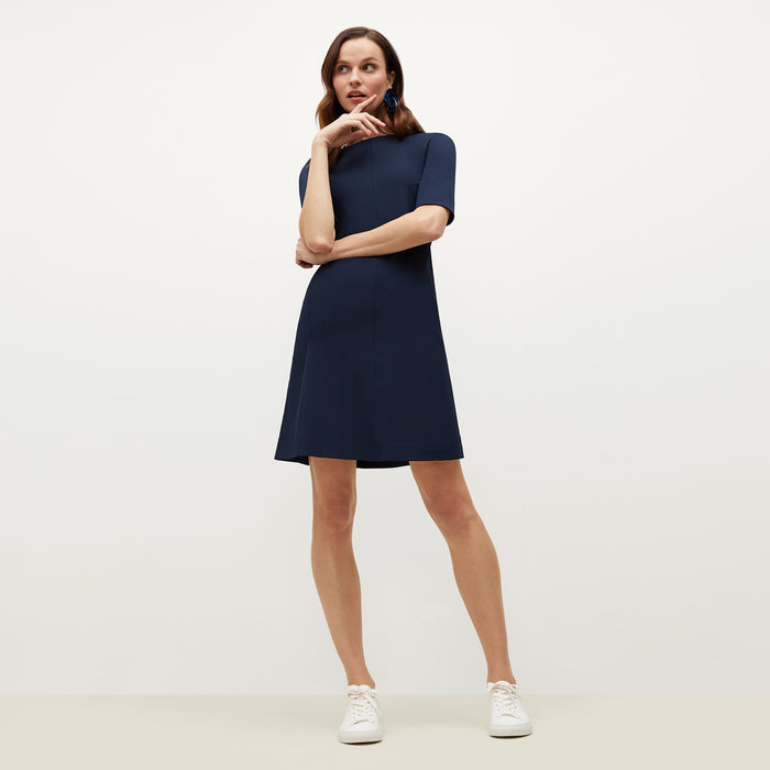 Front image of a woman standing wearing the Emily in Galaxy Blue