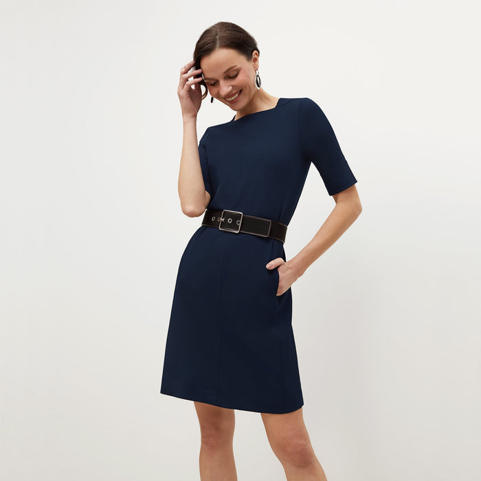 Front image of a woman standing wearing the Emily in Galaxy Blue
