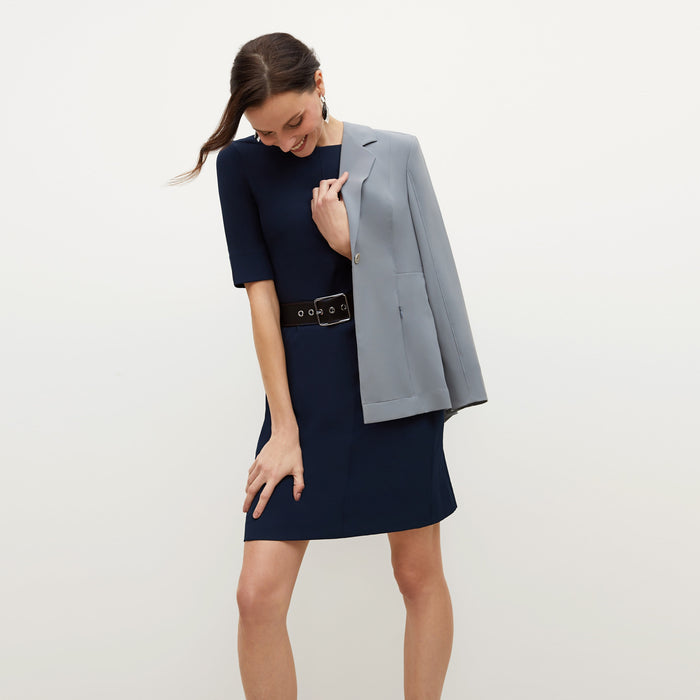 Front image of a woman standing wearing the Emily in Galaxy Blue