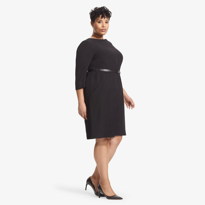 side image of a woman wearing the etsuko dress in black