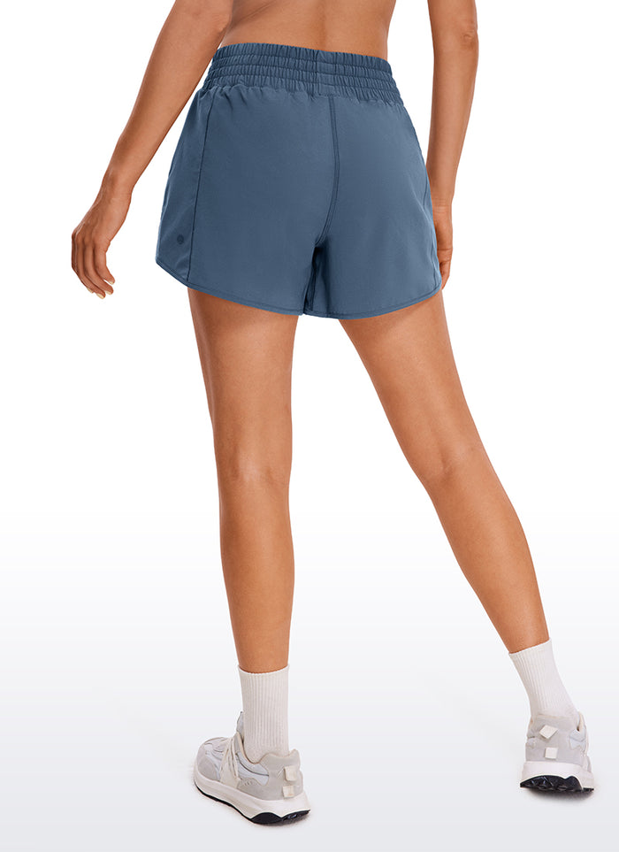 CRZ YOGA Women's Running Feathery-Fit Soft High Rise Lined Shorts 4'' Stelindigo
