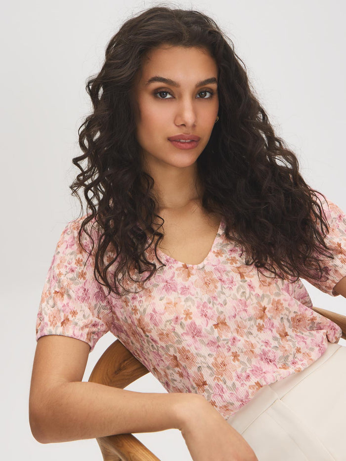 Peach Dust Floral Crinkle V-Neck Top - Seated Front View - Suzy Shier