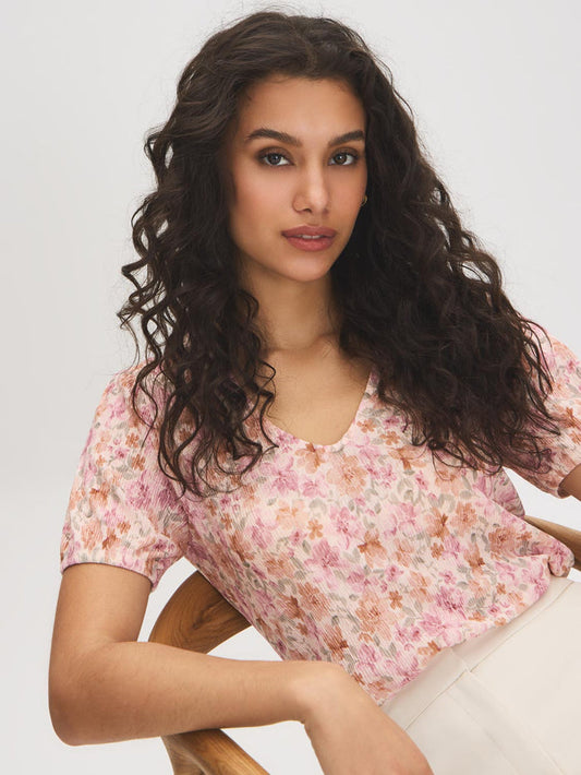 Peach Dust Floral Crinkle V-Neck Top - Seated Front View - Suzy Shier