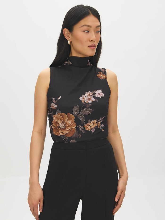 Jet Black Floral Print Mesh Funnel Neck Top - Woman Wearing Sleeveless Ruched Top - Suzy Shier