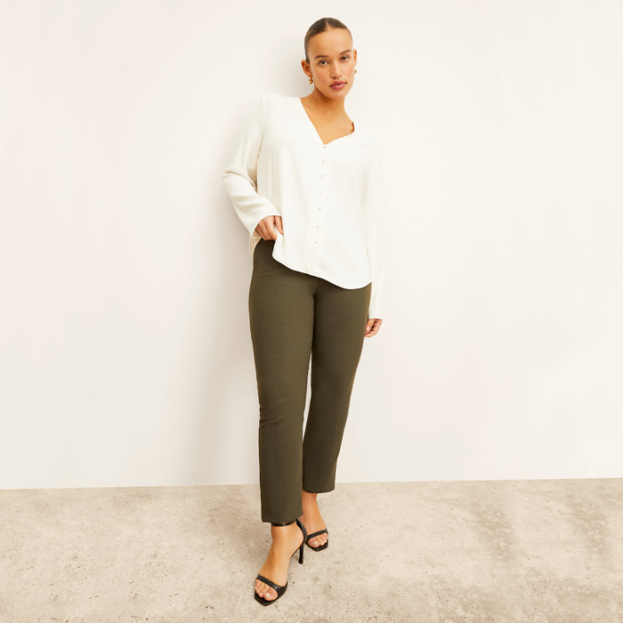 front image of woman wearing foster pant in dark olive