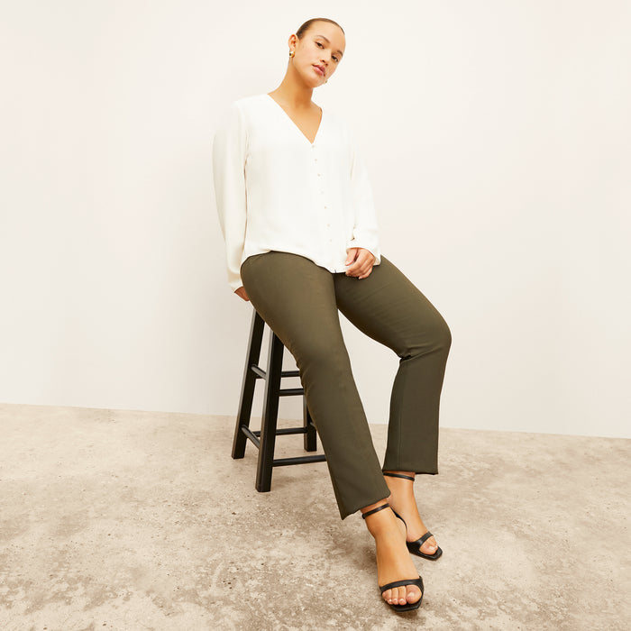 front image of woman wearing foster pant in dark olive