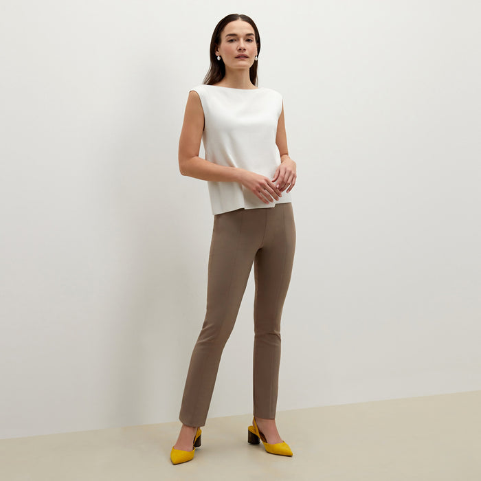 Side image of a woman standing wearing the foster pant in russet | Lead