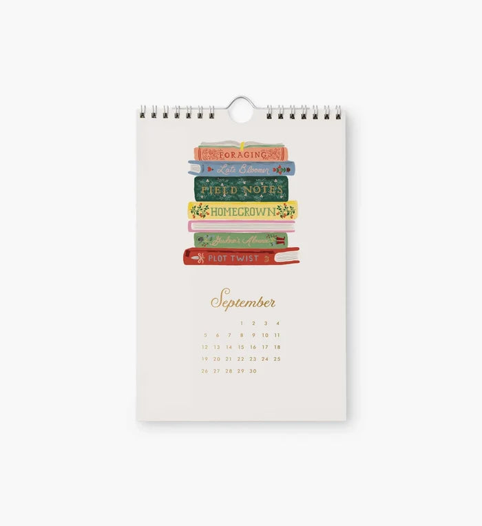 Calendar with book design on a white background