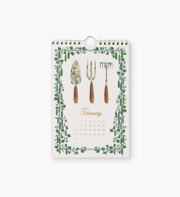 Calendar with gardening tools and floral design on a white background