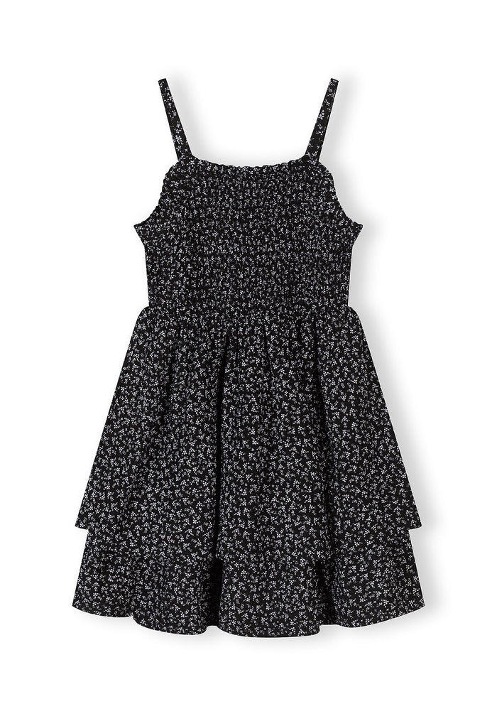 Girls floral summer dress, black, front view with adjustable straps and ruched bodice.
