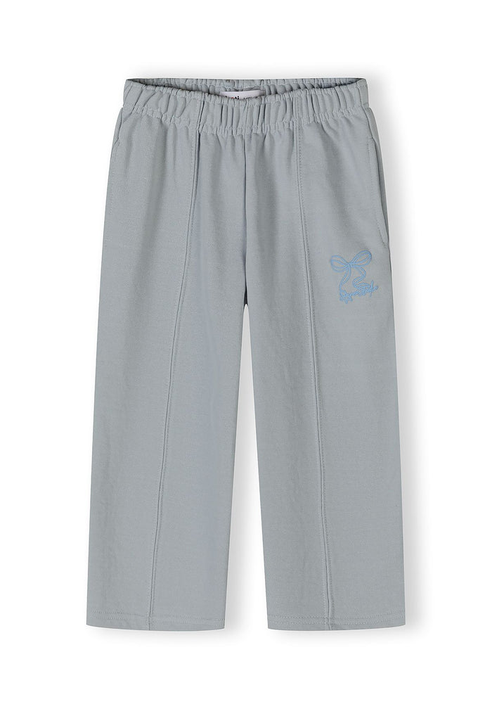 Light blue wide-leg trousers with an adjustable waistband and logo detail.