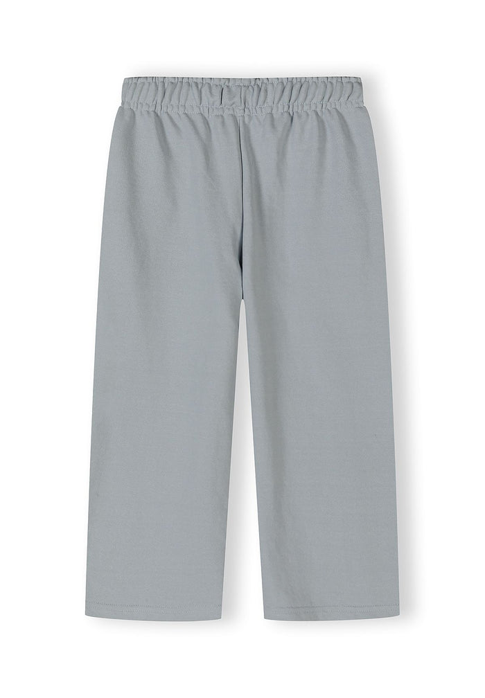 Light blue wide-leg trousers with an adjustable waistband, front view.