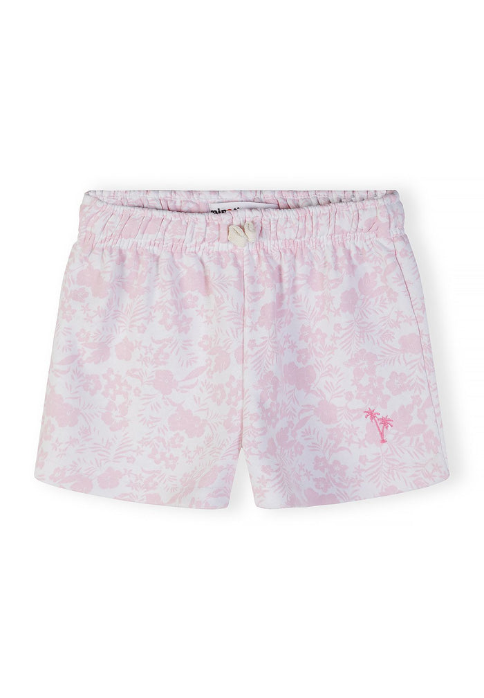 Girls white shorts with pink tropical embroidery, front view, elastic waistband.
