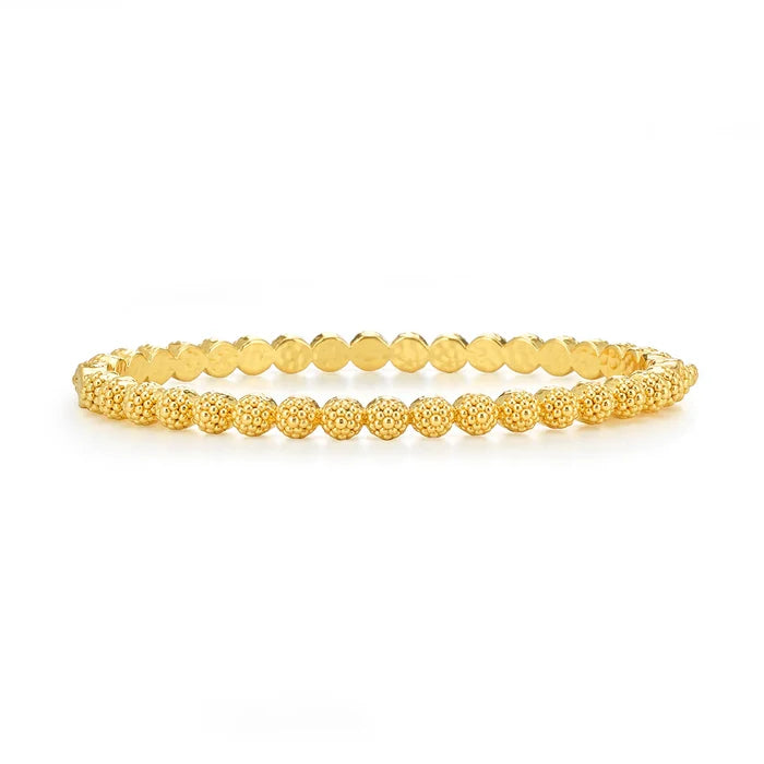Gold bangle bracelet with berry design.