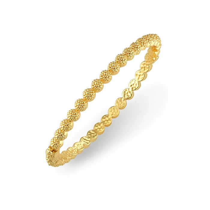 Gold bangle bracelet with berry design. Hinge of bracelet is visible.