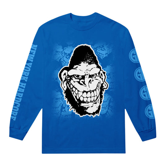 A blue long-sleeve Gorilla Biscuits shirt with a large black and white cartoon gorilla face on the front, NEW YORK HARDCORE text on the right sleeve, and circular logos on the left sleeve.