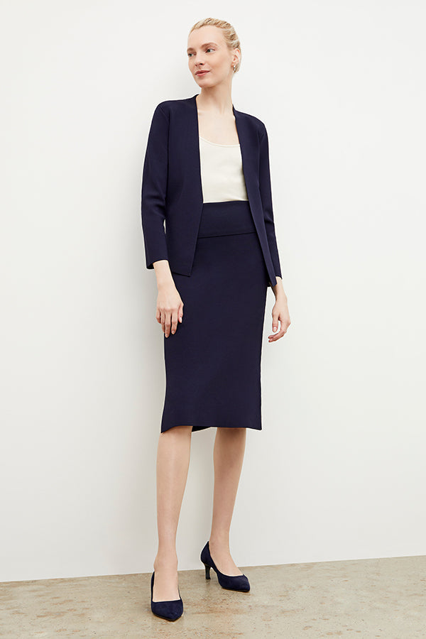 Front image of a woman wearing the harlem skirt in navy | Grid Hover | Exclude