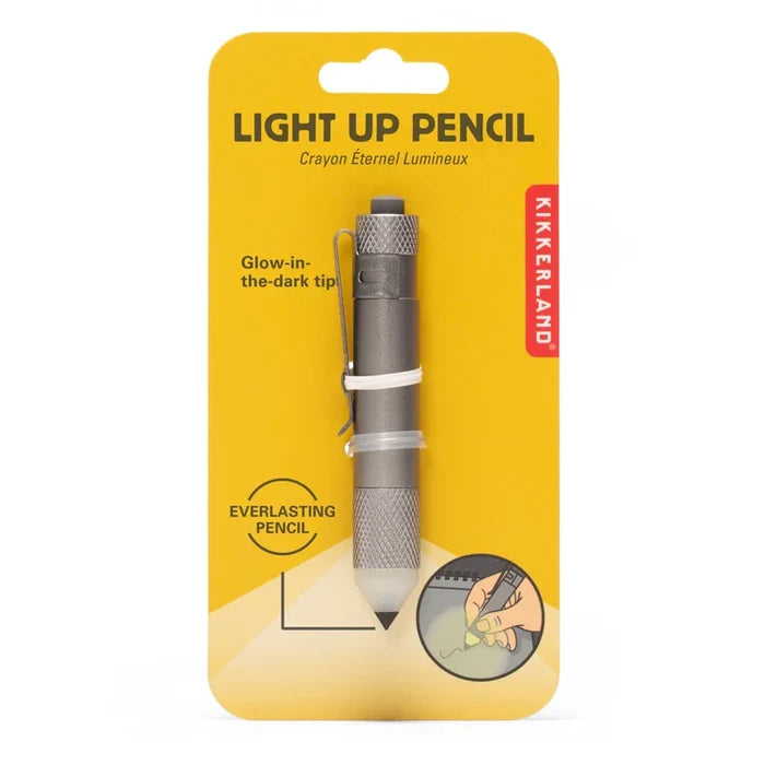 Kikkerland Light Up Pencil in its original yellow blister packaging, featuring a glow-in-the-dark tip.