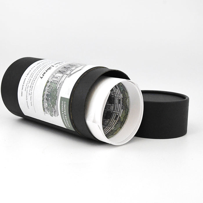 Black cylindrical container with black lid on a white background