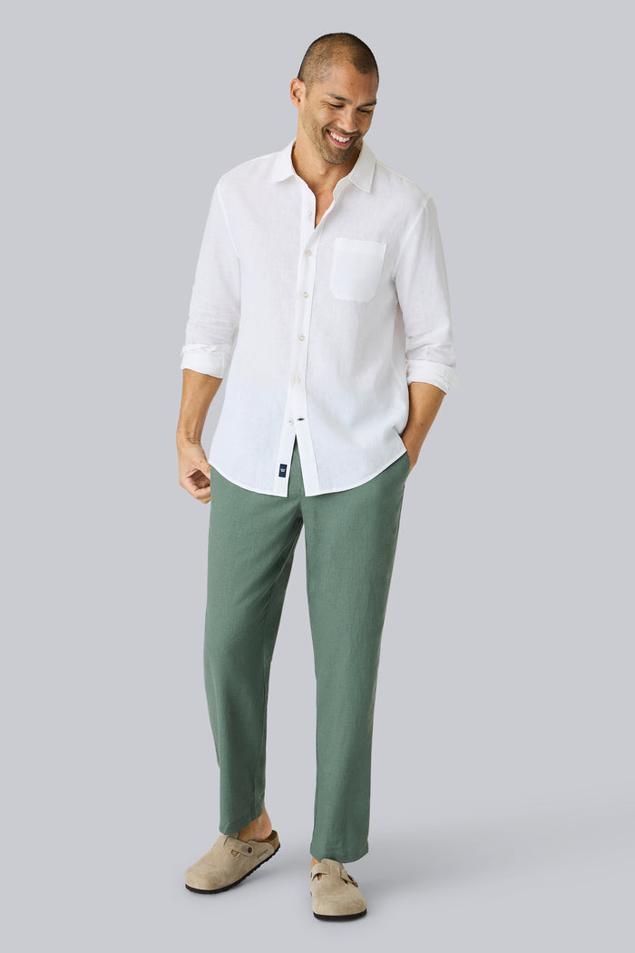 Full front view of a man wearing Linen Button Up in Bright White