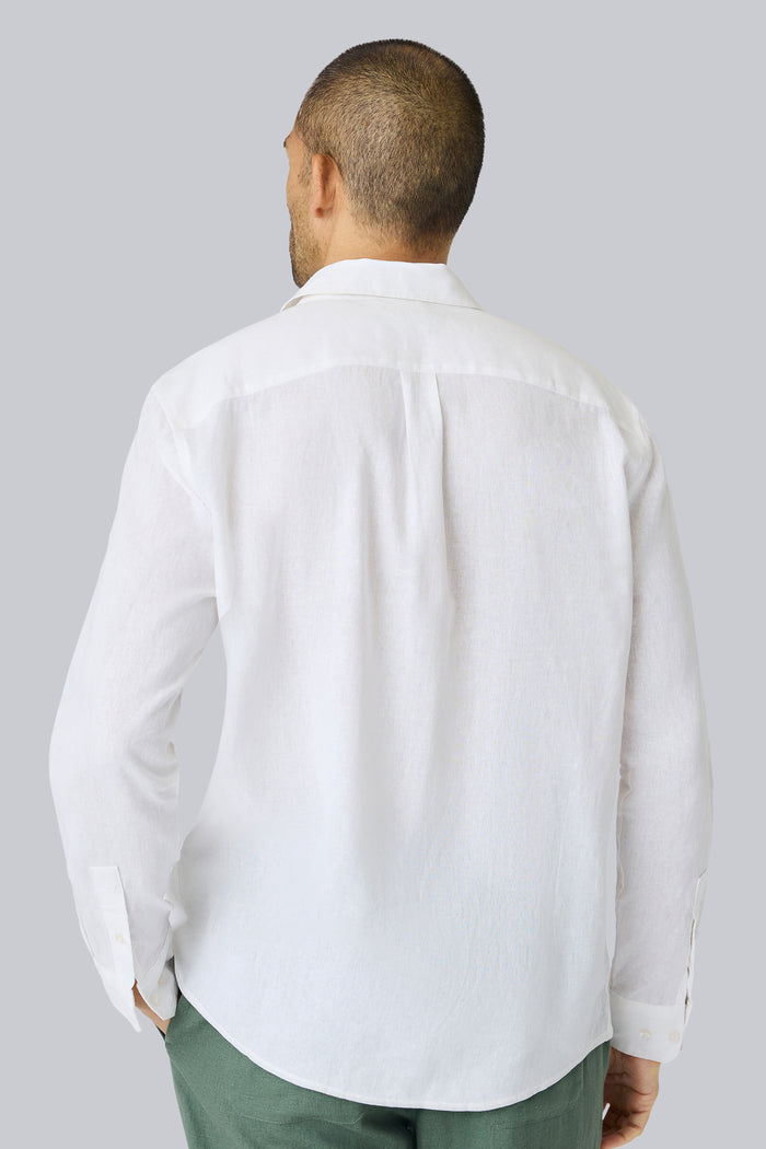 Back view of a man wearing Linen Button Up in Bright White