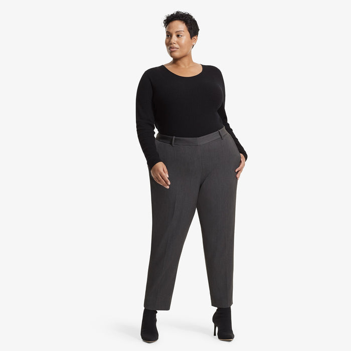 Front image of a woman standing wearing the Loraine top in Black