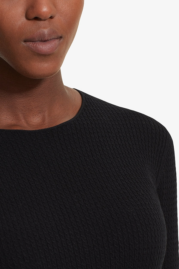 Detail image of a woman standing wearing the Loraine top in Black | Grid Hover | Exclude