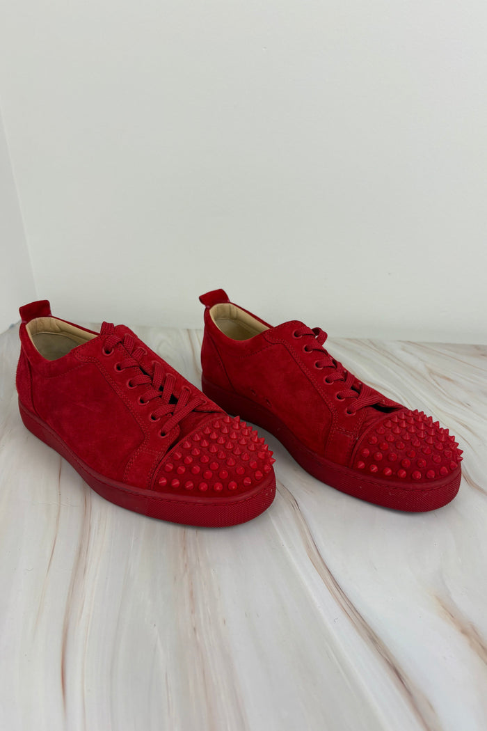 Louboutin red spike sneaker