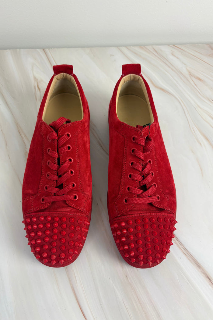 Louboutin red spike sneaker