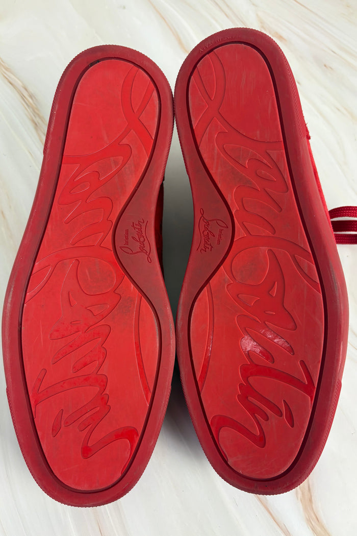 Louboutin red spike sneaker
