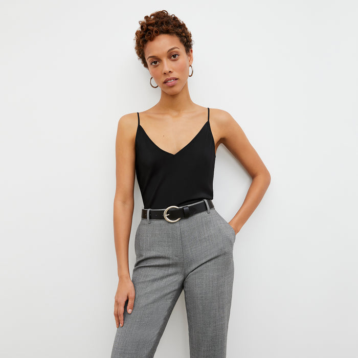 Front image of a woman wearing the Mejia Pant in Black and White Sharkskin
