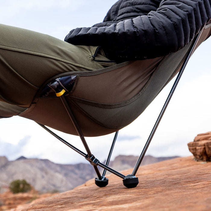 Grand Trunk Monarch - 2 legged Chair rocker feet detail shot on a red rock